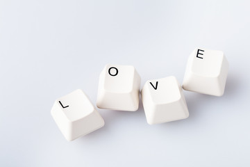 Word LOVE on computer keyboard's  buttons. May be used as symbol