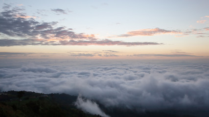 Beautiful mountain with sea of mist and sunrise morning