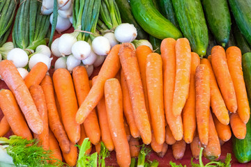 Carrots and cucumber for sale at a market