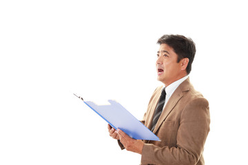 プレゼンをする笑顔のビジネスマン

