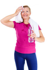 Happy and smile old senior woman in sport outfit marsala color with white towel on her neck, hold...