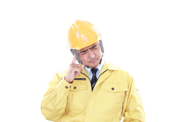 頭痛を訴える作業員