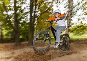 Fototapeta premium boy jumping over a ramp