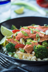 Spicy salmon over cauliflower and broccoli