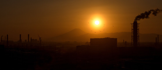 Mountain Fuji and Japan industry zone from Kawasaki city at twilight time.
