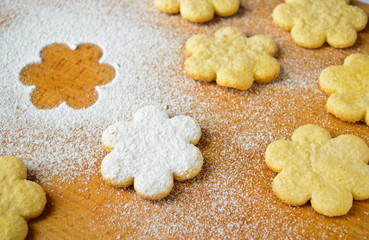 Christmas gingerbread cookies, sprinkled with powdered sugar