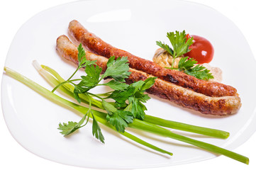 Fried Munich sausages with seasoning and herbs