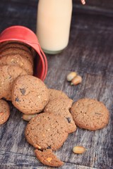 Tasty chocolate chip cookie and sour milk