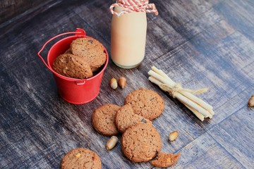 Tasty chocolate chip cookie and sour milk
