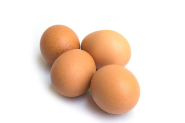 Four eggs isolated on white background