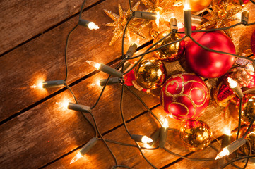christmas baubles wrapped in fairy lights