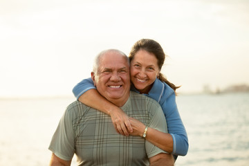 mature couple   during sunset.