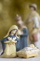 Nativity Scene with Baby Jesus and Mary with Wiseman and Shepherd in Background, Selective Focus, Copy Space.