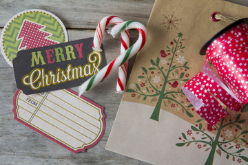 Fototapeta premium Rustic Craft Christmas Decorations, Candy Cane, Ribbon and Labels.