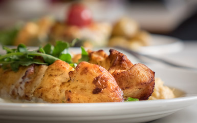 Grilled chicken skewers meal