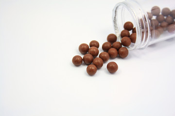 herbal medicine pills on white background
