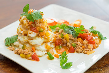 Fried eggs with vegetables