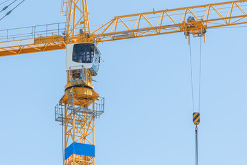 Naklejka premium Yellow crane and blue sky