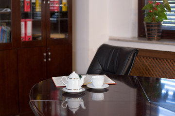 an office waiting for coffee to be served