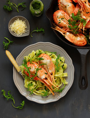 Fried king prawns, served with pasta tagliatelle.