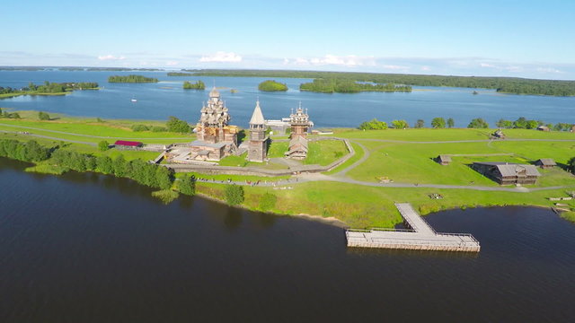 Flying over Kizhi island with old russian wooden architecture in Karelia
