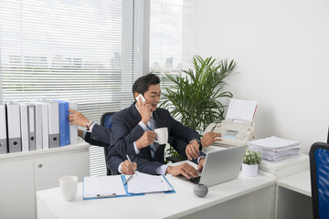 Multitasking businessman