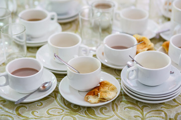 Dirty coffee and tea cups.