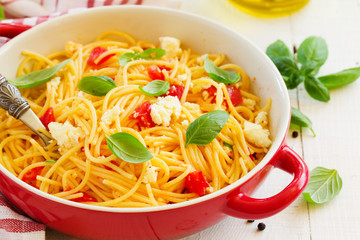 Gluten-free pasta with tomato sauce and cheese.