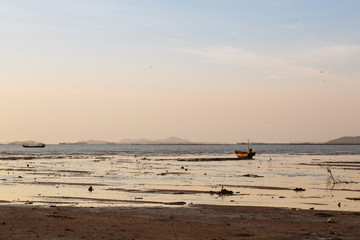 Sunsets and fishing boat