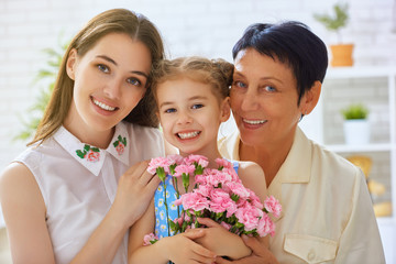 mother and daughter with flowers