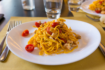 Spaghetti with cherry tomatoes and fish