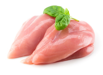 Raw chicken fillet with basil isolated on white