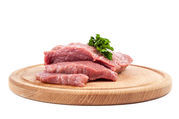 Meat on a cutting board on white background.