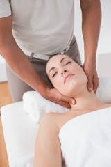 Fototapeta na wymiar Woman receiving neck massage 