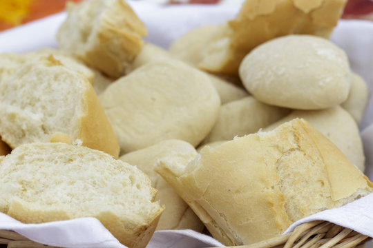 Close-up of bread basket with several kinds of white bread