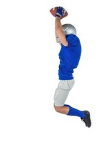 American football player catching ball in mid-air