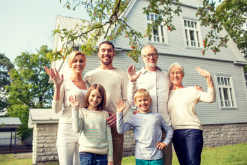 happy family in front of house outdoors