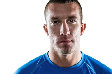 Obraz premium Confident sports player in blue jersey