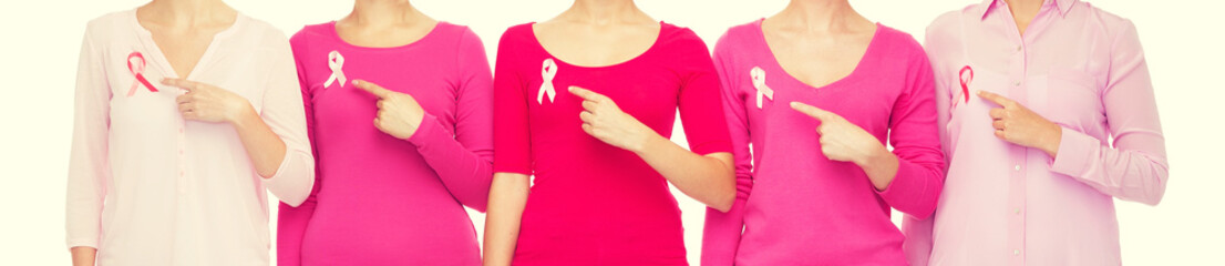 close up of women with cancer awareness ribbons