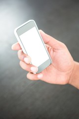 Hand of a businessman holding mobile phone