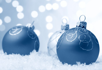 Christmas balls on snow