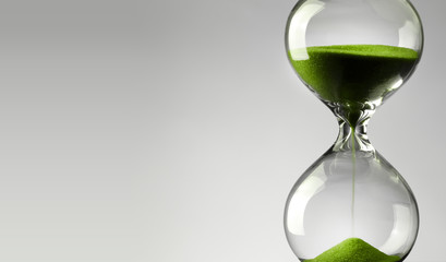 Time passing. Green hourglass. - 91126141