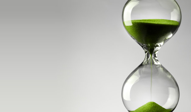 Time passing. Green hourglass.