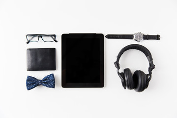 tablet pc, headphones with hipster personal stuff