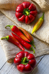 red paprika and pepper on a wooden table