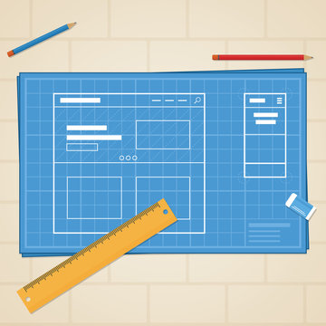 Blue print with website drawing and stationery around it