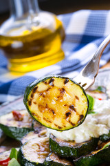 Zucchini.  Grilled zucchini. Slices of grilled zucchini on a plate. Vegetarian - Mediterranean cuisine. 