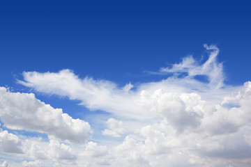 Naklejka na ściany i meble Isolated white cloud on blue sky background