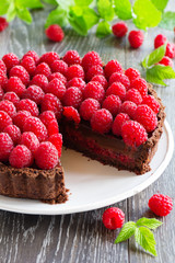 Chocolate tart with fresh raspberries.