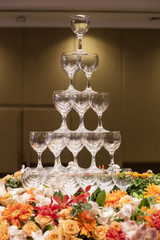 A tower of champagne glasses in Wedding ceremony